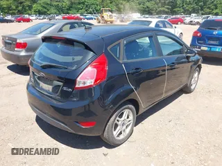 2019 Ford Fiesta SE z VIN 3FADP4EJ0KM125724, wystawiony jako IAAI lot #42320657 z przebiegiem 53 728 mil mil oraz . Historia ofert i sprzedaży dostępna na DreamBid. Obrazek 4.