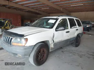 2000 Jeep Grand Cherokee Laredo with VIN 1J4G248S7YC363891, listed as a IAAI auction lot 42715393 with 238,686 mi miles and . Bid and sale history available at DreamBid. Image 2.