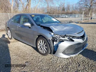 2019 Toyota Camry LE z VIN 4T1B11HK3KU241995, wystawiony jako IAAI lot #41884179 z przebiegiem 118 755 mil mil oraz . Historia ofert i sprzedaży dostępna na DreamBid. Obrazek 1.