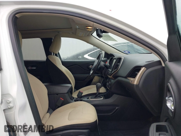 2017 Jeep Cherokee Latitude with VIN 1C4PJLCB5HW571941, listed as a IAAI auction lot 41156440 with 135,862 mi miles and . Bid and sale history available at DreamBid. Image 5.
