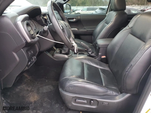 2020 Toyota Tacoma 4WD SR5 with VIN 5TFCZ5AN1LX218079, listed as a Copart auction lot 80085974 with 65,634 mi miles and Salvage Title. Bid and sale history available at carsss.com. Image 7.