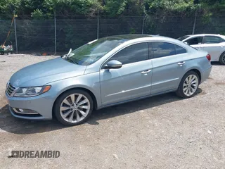 2013 Volkswagen CC Executive z VIN WVWGU7AN3DE524175, wystawiony jako IAAI lot #42401952 z przebiegiem 165 023 mil mil oraz . Historia ofert i sprzedaży dostępna na DreamBid. Obrazek 2.