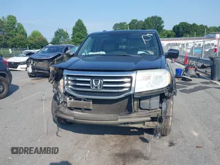 2013 Honda Pilot EX-L with VIN 5FNYF4H65DB060543, listed as a IAAI auction lot 42380911 with 330,452 mi miles and . Bid and sale history available at DreamBid. Image 13.