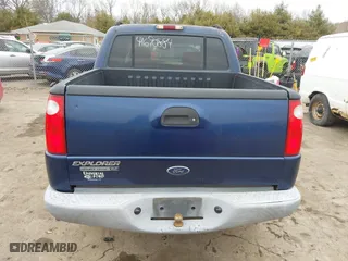 2005 Ford Explorer Sport Trac XLS with VIN 1FMZU77K35UA59213, listed as a IAAI auction lot 41690884 with 219,652 mi miles. Bid and sale history available at carsss.com. Image 16.