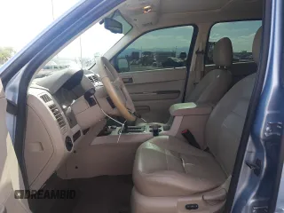 2008 Ford Escape Hybrid with VIN 1FMCU49HX8KE02136, listed as a Copart auction lot 58233195 with 205,532 mi miles and Salvage title. Bid and sale history available at DreamBid. Image 7.