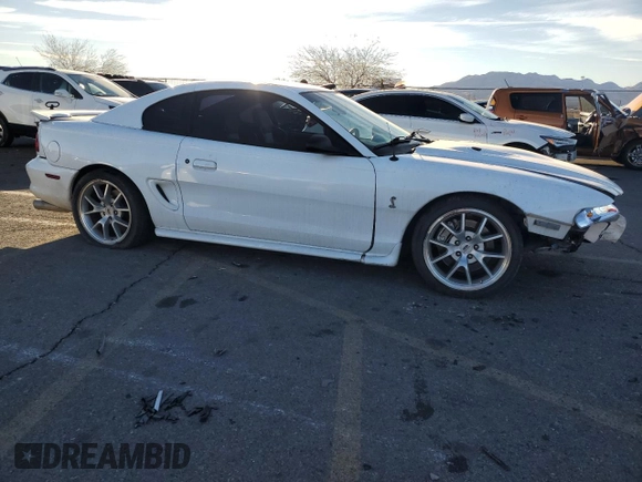 1997 Ford Mustang Cobra with VIN 1FALP47VXVF139807, listed as a Copart auction lot 88045305 with 113,571 mi miles and Salvage Title. Bid and sale history available at carsss.com. Image 4.