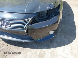 2013 Lexus ES 300h with VIN JTHBW1GG7D2011330, listed as a IAAI auction lot 42036591 with 121,135 mi miles and . Bid and sale history available at DreamBid. Image 6.