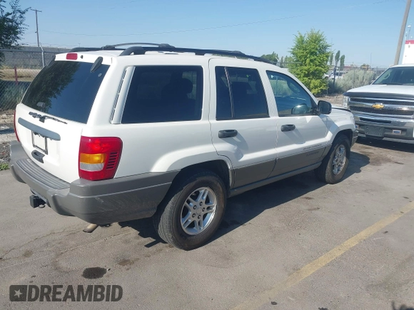 2002 Jeep Grand Cherokee Laredo with VIN 1J4GW48S22C131470, listed as a IAAI auction lot 42599375 with 200,815 mi miles and . Bid and sale history available at DreamBid. Image 4.