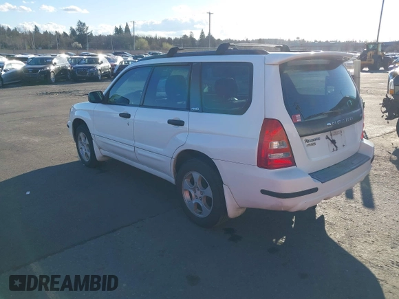 2003 Subaru Forester XS with VIN JF1SG65623H742223, listed as a IAAI auction lot 41713210 with 185,779 mi miles. Bid and sale history available at carsss.com. Image 3.