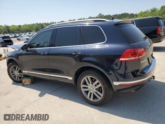 2015 Volkswagen Touareg Lux z VIN WVGEP9BP2FD006802, wystawiony jako Copart lot #52291965 z przebiegiem 122 787 mil mil oraz Szkoda całkowita • Salvage title. Historia ofert i sprzedaży dostępna na DreamBid. Obrazek 2.