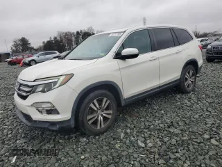 2016 Honda Pilot EX-L with VIN 5FNYF6H59GB054462, listed as a Copart auction lot 44717105 with 95,716 mi miles and Salvage Title. Bid and sale history available at carsss.com. Image 1.