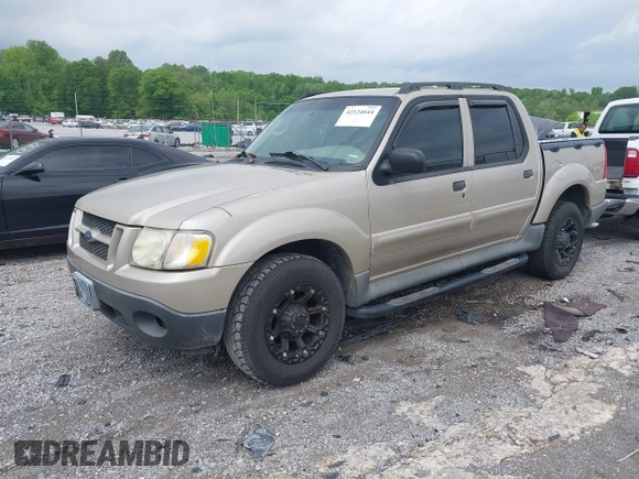 2004 Ford Explorer Sport Trac XLS z VIN 1FMZU67K04UA43558, wystawiony jako IAAI lot #42124644 z przebiegiem 270 550 mil mil oraz . Historia ofert i sprzedaży dostępna na DreamBid. Obrazek 2.