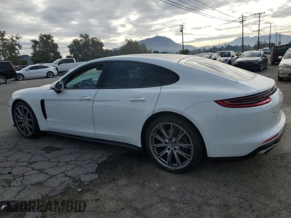 2020 Porsche Panamera с VIN WP0AA2A74LL103885, выставлен на аукционе Copart как лот 82222264 с пробегом 38 576 миль миль и Списание • Salvage title. История ставок и продаж доступна на DreamBid. Изображение 2.