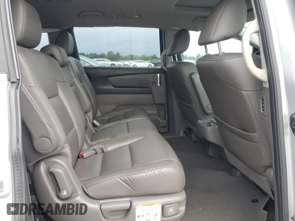 2014 Honda Odyssey EX-L with VIN 5FNRL5H62EB003236, listed as a Copart auction lot 63342255 with 147,398 mi miles and Salvage title. Bid and sale history available at DreamBid. Image 11.