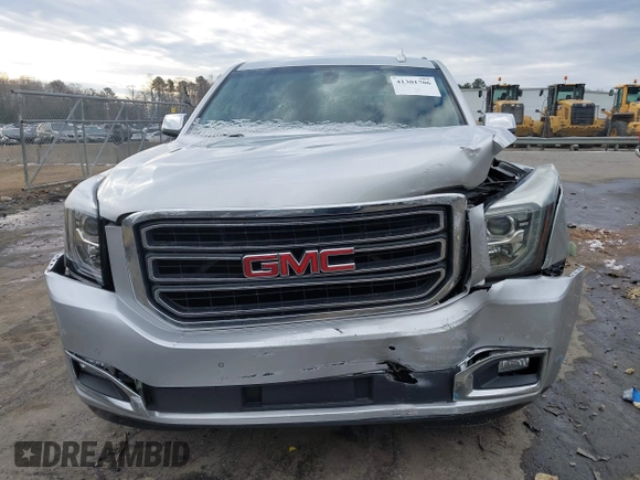 2016 GMC Yukon SLE with VIN 1GKS2AKC0GR332224, listed as a IAAI auction lot 41301706 with 108,340 mi miles. Bid and sale history available at carsss.com. Image 12.