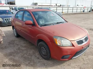2011 Kia Rio LX with VIN KNADH4A31B6917617, listed as a IAAI auction lot 41634525 with 135,540 mi miles. Bid and sale history available at carsss.com. Image 1.