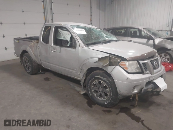 2015 Nissan Frontier SV with VIN 1N6AD0CW4FN751068, listed as a IAAI auction lot 41024078 with 900,000 mi miles and . Bid and sale history available at DreamBid. Image 1.