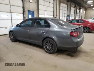 2009 Volkswagen Jetta z VIN 3VWRA71K59M032737, wystawiony jako Copart lot #43270605 z przebiegiem 120 104 mil mil oraz Szkoda całkowita • Salvage title. Historia ofert i sprzedaży dostępna na DreamBid. Obrazek 2.