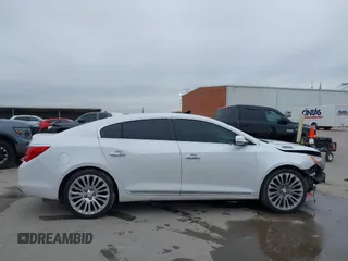 2016 Buick LaCrosse Premium II with VIN 1G4GF5G3XGF180410, listed as a IAAI auction lot 41648448 with 117,981 mi miles and . Bid and sale history available at DreamBid. Image 13.