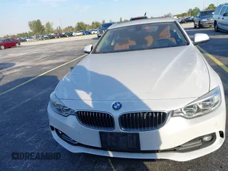 2014 BMW 4 Series 435i with VIN WBA3R1C51EK192795, listed as a IAAI auction lot 41263037 with 22,937 mi miles and . Bid and sale history available at DreamBid. Image 6.