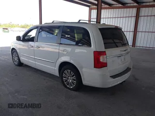 2014 Chrysler Town & Country Touring-L with VIN 2C4RC1CG2ER312444, listed as a IAAI auction lot 42050774 with 124,010 mi miles. Bid and sale history available at carsss.com. Image 3.