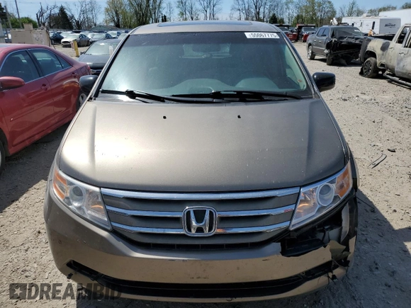 2011 Honda Odyssey Touring Elite with VIN 5FNRL5H9XBB030061, listed as a Copart auction lot 55067775 with 142,245 mi miles and Clean Title. Bid and sale history available at DreamBid. Image 5.