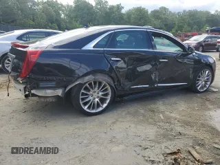 2014 Cadillac XTS Platinum z VIN 2G61W5S86E9151010, wystawiony jako Copart lot #58155335 z przebiegiem 48 437 mil mil oraz Szkoda całkowita • Salvage title. Historia ofert i sprzedaży dostępna na DreamBid. Obrazek 3.