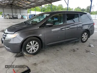 2014 Honda Odyssey EX-L with VIN 5FNRL5H67EB061200, listed as a Copart auction lot 56065895 with 189,887 mi miles and Salvage title. Bid and sale history available at DreamBid. Image 1.