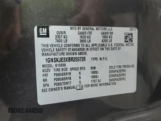 2011 Chevrolet Suburban LT with VIN 1GNSKJE3XBR259726, listed as a Copart auction lot 66365284 with 210,577 mi miles and Salvage Title. Bid and sale history available at carsss.com. Image 13.
