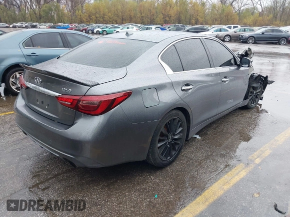 2018 Infiniti Q50 Luxe z VIN JN1EV7AP5JM350376, wystawiony jako IAAI lot #40881855 z przebiegiem 84 501 mil mil oraz . Historia ofert i sprzedaży dostępna na DreamBid. Obrazek 4.