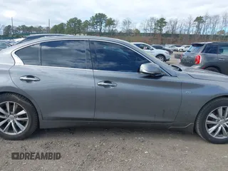 2017 Infiniti Q50 2.0t Premium with VIN JN1CV7AR9HM681464, listed as a IAAI auction lot 42055659 with 100,179 mi miles. Bid and sale history available at carsss.com. Image 13.
