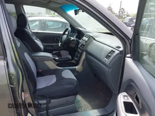 2007 Honda Pilot EX-L with VIN 5FNYF28667B025454, listed as a IAAI auction lot 42151117 with 287,169 mi miles and . Bid and sale history available at carsss.com. Image 5.