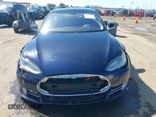 2014 Tesla Model S 60 with VIN 5YJSA1H11EFP47897, listed as a IAAI auction lot 41802285 with Not Provided miles and . Bid and sale history available at DreamBid. Image 13.