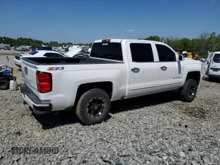 2016 Chevrolet Silverado 1500 LT with VIN 3GCUKREC9GG185402, listed as a Copart auction lot 52292115 with 131,861 mi miles and Salvage Title. Bid and sale history available at DreamBid. Image 3.