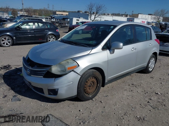 2009 Nissan Versa 1.8 SL with VIN 3N1BC13E09L393563, listed as a IAAI auction lot 41977998 with 163,072 mi miles. Bid and sale history available at carsss.com. Image 2.