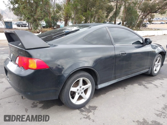 2003 Acura RSX with VIN JH4DC54853C017397, listed as a IAAI auction lot 42179973 with 219,490 mi miles. Bid and sale history available at carsss.com. Image 4.