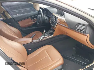 2012 BMW 3 Series 328i with VIN WBA3A5C57CF347953, listed as a IAAI auction lot 42176008 with 140,598 mi miles and . Bid and sale history available at carsss.com. Image 5.