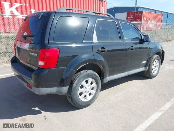 2008 Mazda Tribute Grand Touring with VIN 4F2CZ02Z28KM14136, listed as a IAAI auction lot 41878738 with 155,465 mi miles. Bid and sale history available at carsss.com. Image 4.