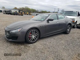 2018 Maserati Ghibli S Q4 z VIN ZAM57YTA4J1279934, wystawiony jako Copart lot #53967905 z przebiegiem 64 999 mil mil oraz Szkoda całkowita • Salvage title. Historia ofert i sprzedaży dostępna na DreamBid. Obrazek 1.