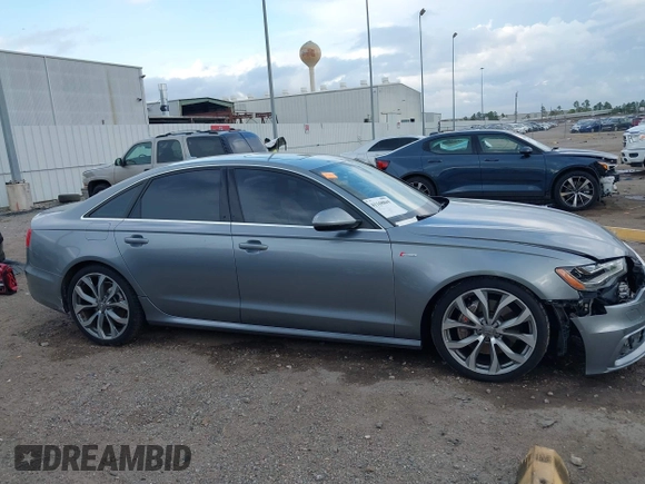 2013 Audi A6 3.0T Prestige with VIN WAUHGAFC3DN131239, listed as a IAAI auction lot 41168869 with 134,628 mi miles. Bid and sale history available at carsss.com. Image 12.