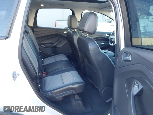 2017 Ford Escape Titanium with VIN 1FMCU9J93HUE96611, listed as a IAAI auction lot 41546906 with 90,586 mi miles. Bid and sale history available at carsss.com. Image 8.
