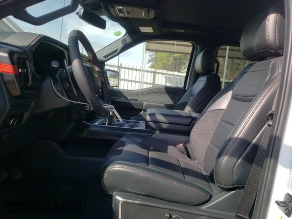 2024 Ford F-150 Raptor with VIN 1FTFW1RG5RFA24884, listed as a Copart auction lot 48981025 with 116 mi miles and Salvage Title. Bid and sale history available at DreamBid. Image 7.