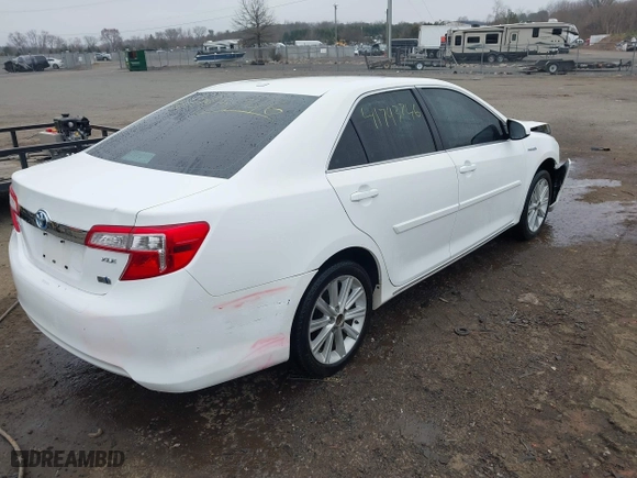 2014 Toyota Camry Hybrid LE with VIN 4T1BD1FK1EU102768, listed as a IAAI auction lot 41793746 with 157,015 mi miles. Bid and sale history available at carsss.com. Image 4.