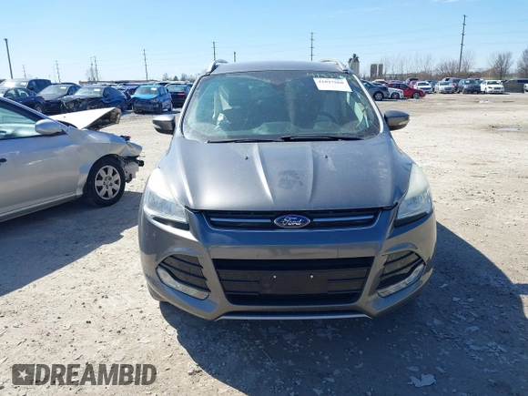 2014 Ford Escape Titanium with VIN 1FMCU9J93EUC72752, listed as a IAAI auction lot 41827668 with 91,194 mi miles and . Bid and sale history available at DreamBid. Image 12.