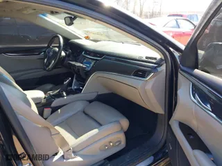 2013 Cadillac XTS Luxury with VIN 2G61R5S33D9184878, listed as a IAAI auction lot 41644213 with 113,293 mi miles. Bid and sale history available at carsss.com. Image 5.