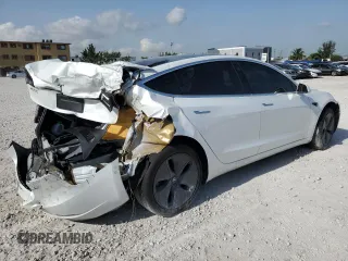 2020 Tesla Model 3 Standard Range Plus z VIN 5YJ3E1EA3LF632566, wystawiony jako Copart lot #56416625 z przebiegiem Nie podano mil oraz Nie do naprawy • Non repairable. Historia ofert i sprzedaży dostępna na DreamBid. Obrazek 3.