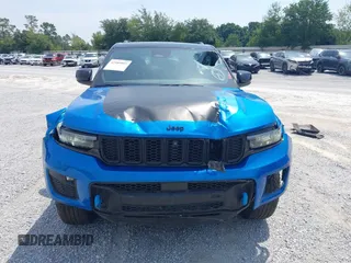 2022 Jeep Grand Cherokee Trailhawk with VIN 1C4RJYC68N8759961, listed as a IAAI auction lot 42589997 with 28,429 mi miles and . Bid and sale history available at DreamBid. Image 13.