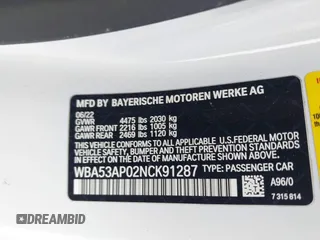 2022 BMW 4 Series 430i with VIN WBA53AP02NCK91287, listed as a IAAI auction lot 41448686 with 27,046 mi miles and . Bid and sale history available at carsss.com. Image 9.