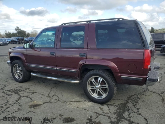 1995 Chevrolet Tahoe with VIN 1GNEK13K9SJ445554, listed as a Copart auction lot 50945835 with 206,626 mi miles and Salvage Title. Bid and sale history available at carsss.com. Image 2.