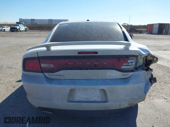 2014 Dodge Charger SXT with VIN 2C3CDXHG2EH104640, listed as a IAAI auction lot 41379760 with 122,664 mi miles and . Bid and sale history available at DreamBid. Image 16.